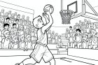 garçon joue au basket-ball