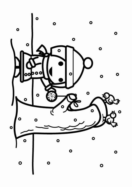 nourrir les oiseaux dans la neige (boule de graisse)