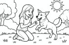 une fille joue avec son chien