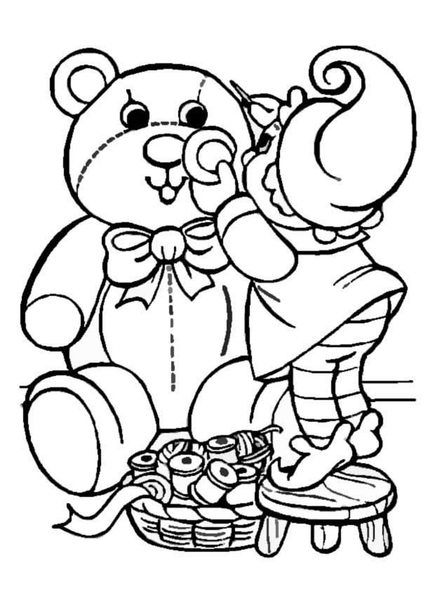 elf qui fait un jouet Coloriage elf qui fait un jouet