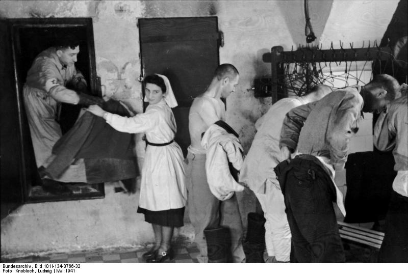 pologne - ghetto de varsovie - A©change de vAªtements Photo pologne - ghetto de varsovie - A©change de vAªtements
